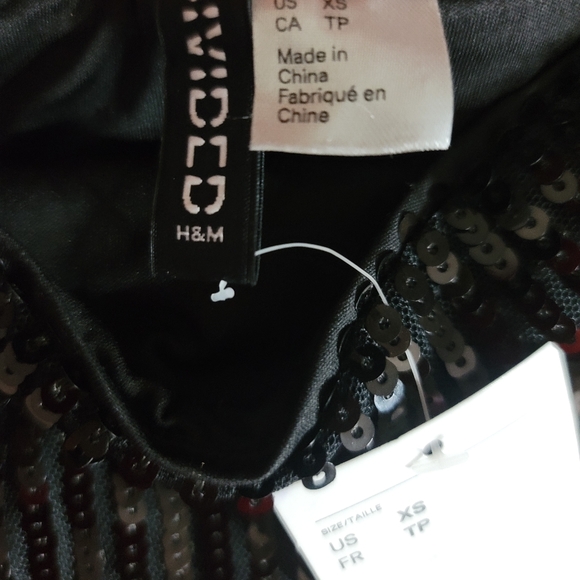 Mini black dress by H&M - Picture 16 of 17